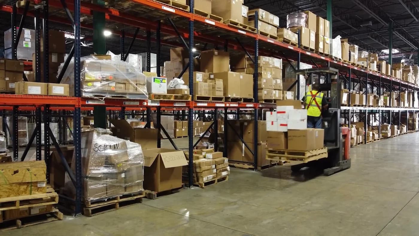 Illustrative warehouse scene with pallet handling equipment